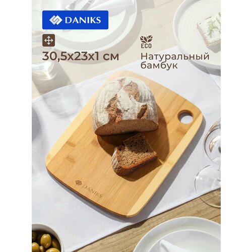 Daniks ����� ����������� ���������� 30.5�23�1 ��, � ������ ������, ������ ������ 1068 ����